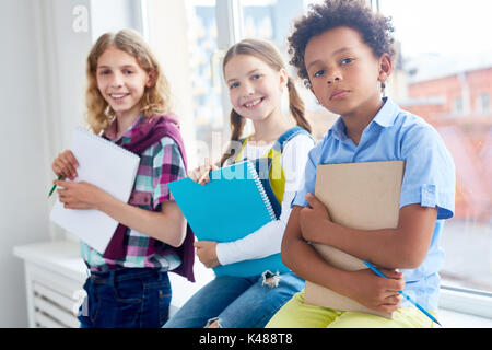 Friends in classroom Stock Photo