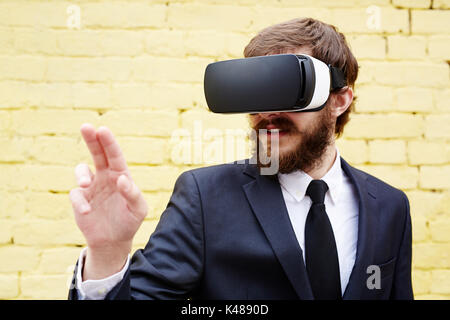 Touching imaginary world Stock Photo