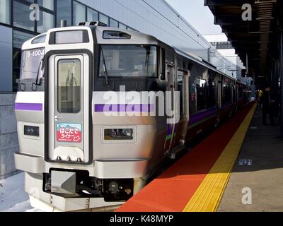 Hakodate Liner B-1004 Rapid Express train stopping at Hakodate Station Stock Photo