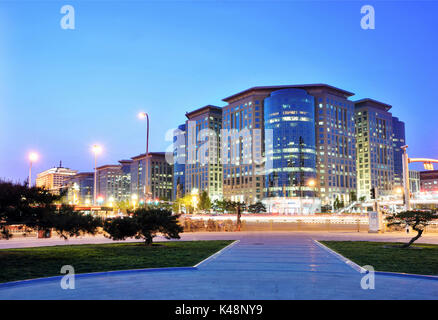 Beijing Oriental Plaza buildings at night, transport and ordinary urban life of the city. Stock Photo