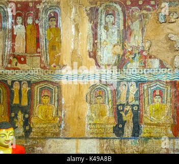 BATTALA, SRI LANKA - DECEMBER 2, 2016: The walls in Image House of Yudaganawa  temple are decorated with the medieval frescos, depicting life of Lord  Stock Photo