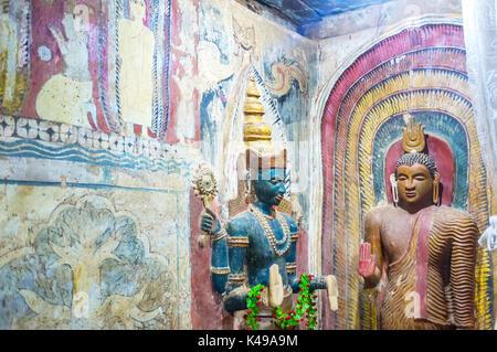 BATTALA, SRI LANKA - DECEMBER 2, 2016: Buddhism and Hinduism are closely connected in Sri Lanka, the statues of Vishnu and Buddha are neighboring in Y Stock Photo