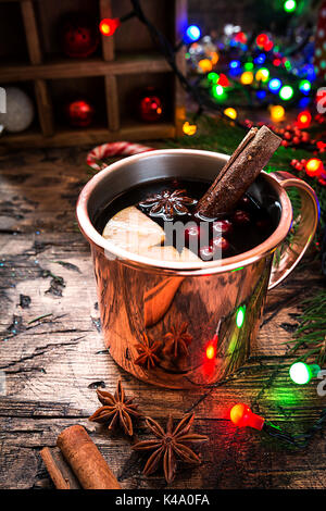 Mulled wine in mug with mug warmer Stock Photo - Alamy