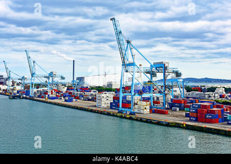 Dublin Ireland Docks harbour area cranes and containers with lorries Stock Photo