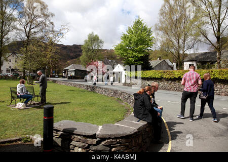 Tourists in the centre of the village of Grasmere in the Lake District, Cumbria Stock Photo