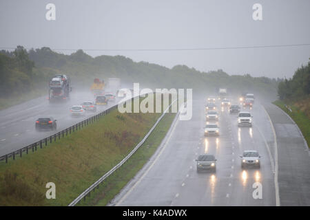 Heavy rain hits morning commuters on the M1 Motorway at Barnsley, South Yorkshire, UK. Stock Photo