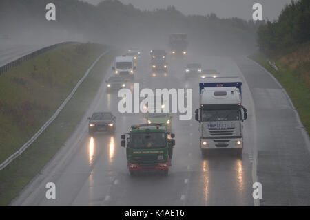 Heavy rain hits morning commuters on the M1 Motorway at Barnsley, South Yorkshire, UK. Stock Photo