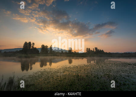 Sunrise at the lake Cerknica, Cerknisko jezero, intermittent lake, Cerknica Polje, Nature reserve Rakov Škocjan, Slovenia Stock Photo