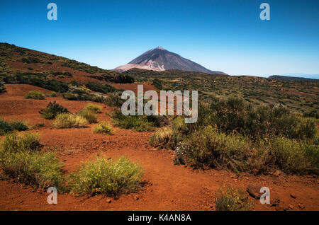 Scenic landscape with the volcano mount and red sand desert of the Teide National Park, Tenerife, Canary Islands, Spain. Stock Photo