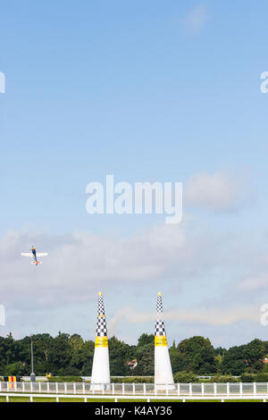 Ascot, Berkshire, UK. High-octane action over Ascot race course on day one of the Red Bull Air Race. Stock Photo