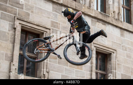 Nuremberg, Germany. 2nd Sep, 2017. US-American mountainbiker Nicholi Rogatkin in action at the 'Red Bull District Ride' on the Hauptmarkt square in Nuremberg, Germany, 2 September 2017. During the competition, the riders present their skills with jumps and tricks in a parcours leading through the old town. The District Ride has taken place in 2005, 2006, 2011 and 2014 in Nuremberg. Photo: Silas Stein/dpa/Alamy Live News Stock Photo