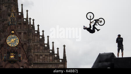 Nuremberg, Germany. 2nd Sep, 2017. Swedish mountainbiker Emil Johansson in action at the 'Red Bull District Ride' on the Hauptmarkt square in Nuremberg, Germany, 2 September 2017. During the competition, the riders present their skills with jumps and tricks in a parcours leading through the old town. The District Ride has taken place in 2005, 2006, 2011 and 2014 in Nuremberg. Photo: Silas Stein/dpa/Alamy Live News Stock Photo
