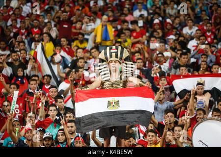 Alexandria, Egypt. 5th Sep, 2017. Egyptian fans cheer before the 2018 World Cup group E qualifying soccer match between Egypt and Uganda at the Borg El Arab Stadium in Alexandria, Egypt, Tuesday, Sept. 5, 2017. Credit: Islam Safwat/Alamy Live News Stock Photo