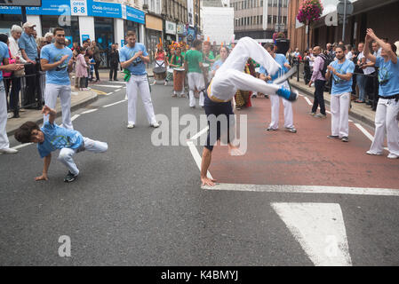 Performing Capoeira, an Afro-Brazilian martial art dance, Kingston Carnival, Kingston upon Thames, Surrey, UK 03/09/2017 Stock Photo