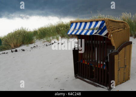 Strandkorb/beach chair on Usedom, Baltic Sea in front of sand dune Stock Photo