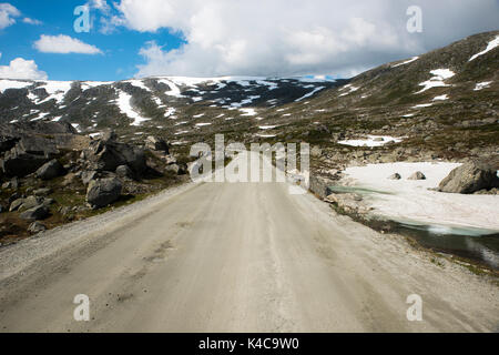 gamle strynefjellsvegen road one of the most beautifull auto roads in norway with snow in summer Stock Photo