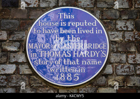 DORCHESTER, UK - AUGUST 15TH 2017: A blue plaque marking the location where the Mayor of Casterbridge reputed lived in the Thomas Hardy novel, taken o Stock Photo