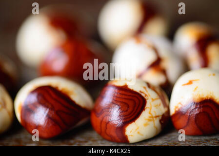 group of white and brown unripe chestnuts closeup Stock Photo