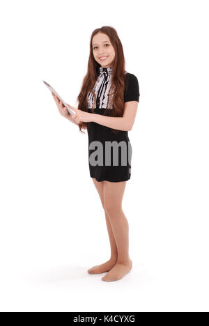 Smiling student teenage girl showing a tablet display application isolated on white. Stock Photo