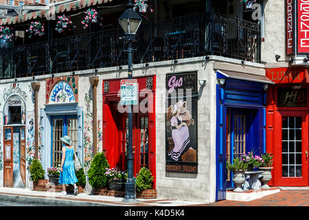 Woman walking in front of colorful Italian restaurant, Little Italy neighborhood, Baltimore, Maryland USA Stock Photo