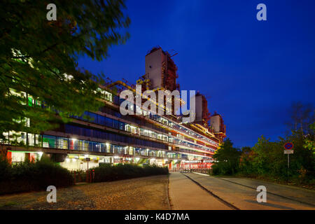 The modern university clinic of Aachen, Germany with night blue sky. Perspective corrected via lens shift. Stock Photo