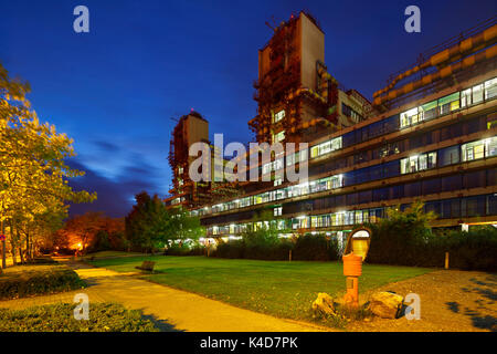 The modern university clinic of Aachen, Germany with night blue sky. Perspective corrected via lens shift. Stock Photo