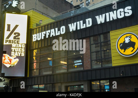 The Times Square branch of the Buffalo Wild Wings restaurant chain in New York on Tuesday, August 29, 2017. Shares of the fast casual chain have dropped 15.8% since its bleak earnings report a month ago. (© Richard B. Levine) Stock Photo