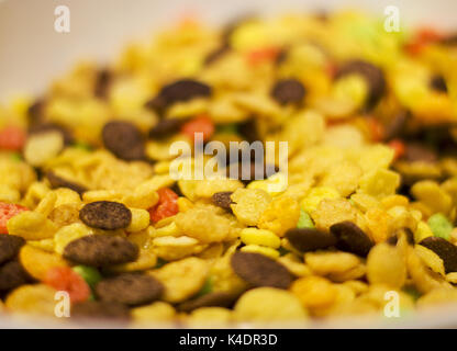 Corn flakes and chocolate flakes for breakfast. Selective focus Stock Photo