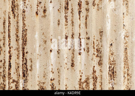 Old rusted corrugated metal wall texture, frontal background photo Stock Photo