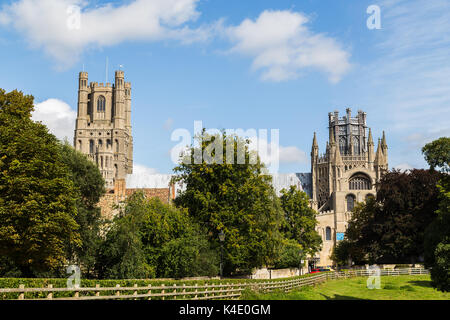 The south facing facade of the Anglican cathedral in Ely seen contrasting against the blue summer skies of Cambridgeshire. Stock Photo