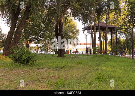 KYIV, UKRAINE -JUNE 10, 2017: Local people and tourists rest in Natalka park in the evening, Kyiv, Ukraine Stock Photo