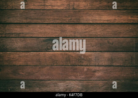 Vintage surface wood table and rustic grain texture background. Close up of dark rustic wall made of old wood table planks texture. Rustic brown wood  Stock Photo