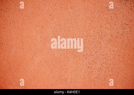 Ocher painted wall background in high resolution Stock Photo