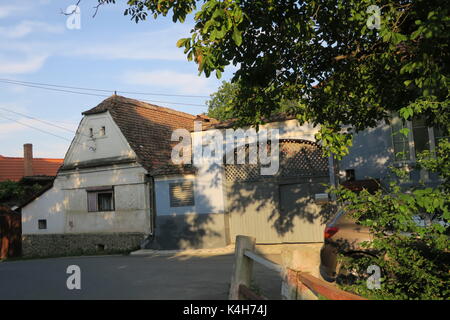 Simple small houses in a village Sibiel, near Sibiu city, Romania. Stock Photo