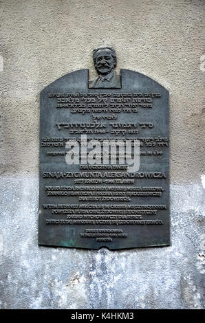 Commemorative plaque dedicated to Sinai Zygmunt Aleksandrowicz (1877-1946) at 6 Podbrzezie St. in the old Jewish district of Kazimierz, Cracow,Poland. Stock Photo