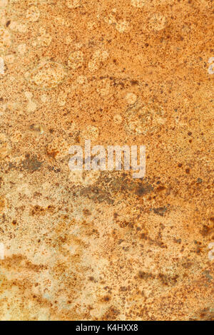Rusted painted metal wall. Rusty metal background with streaks of rust. The metal surface rusted spots Stock Photo