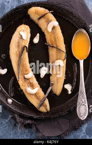 Sweetened Fried Bananas Recipe. Banana Dessert. Stock Photo