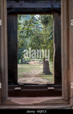 Trees seen through from window of Hindu temple in Angkor Wat style, Banteay Samre, Siem Reap, Cambodia Stock Photo
