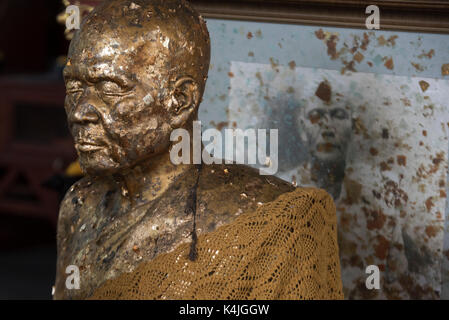 Close-up of monk's statue in Wat Khunaram, Koh Samui, Surat Thani Province, Thailand Stock Photo
