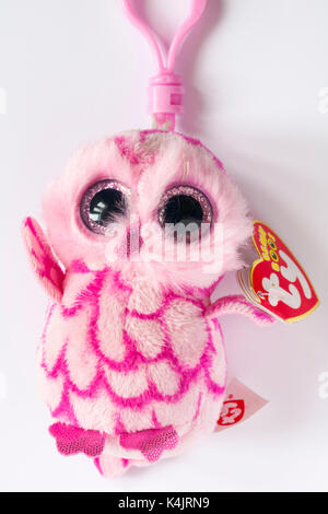 ty beanie boo's PINKY pink barn owl clip soft cuddly toy set on white background Stock Photo