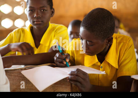 Students studying in classroom at a Junior High School, Northern Ghana, West Africa, Africa Stock Photo