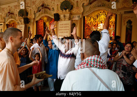 Dancing and chanting at Krishna-Balaram temple, Vrindavan, Uttar Pradesh, India, Asia Stock Photo