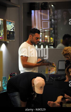 Milan, Aida Yespica and boyfriend Giuseppe Lama shopping before the GF vip A few hours after departure to attend the Great VIP Brother, Aida Yespica comes to the center with her boyfriend, the 30-year-old Neapolitan entrepreneur Giuseppe Lama, said Geppy, son of a Famous family who works in the world of optics, and accompanied by a friend, they go shopping. Here, they walk in via Montenapoleone, after being in Corso Vittorio Emanuele, and having greeted some friends, enter Joshua F.'s boutique to buy shoes. Stock Photo