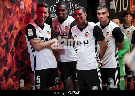 05 Gabriel Paulista  of Valencia CF (L) 16 Geoffrey Kondogbia  of Valencia CF (2L) 04 Jeison Murillo of Valencia CF (2R) and 11 Andreas Hugo Hoelgebaum Pereira (R) during  presentation of the new summer signings of valencia cf next to the valencia's fans at Mestalla  Stadium on  September  6, 2017. Stock Photo