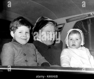 Dec. 12, 1961 - Royal children leave for Windsor.: Viscount Linley and Lady Sarah Armstrong-Jones, the children of Princess Margaret and Lord Snowdon, left Kensington Palace today for Windsor Castle, where they will spend Christmas. Photo shows Viscount Linley and Lady Sarah, pictured with their nanny when they left for Windsor today. (Credit Image: © Keystone Press Agency/Keystone USA via ZUMAPRESS.com) Stock Photo