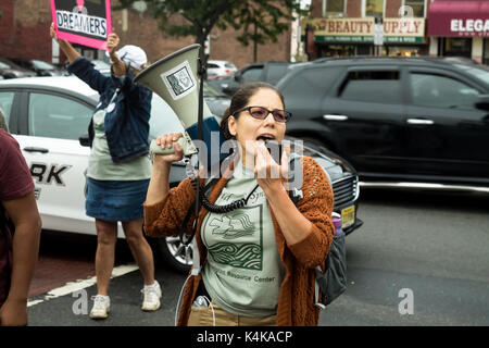 Immigrants and activists took to the streets in Newark, New Jersey on Sep. 6th to protest Donald Trumps recent rollbacks on the Dreamers program. Stock Photo