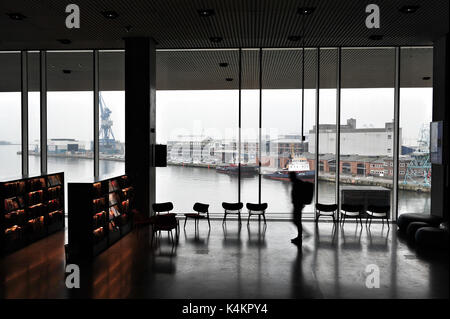 View of Aarhus' waterfront from the library inside Dokk1, a new culture and multimedia house in Aarhus, Denmark. Stock Photo