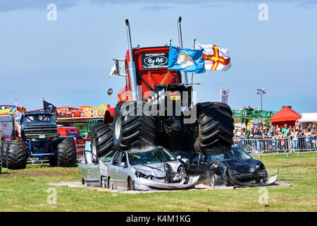 Wrecker Trucks Demonstration Guernsey, West Show,  Horticulture and Agriculture. Crushing cars.'Big Pete'. Stock Photo