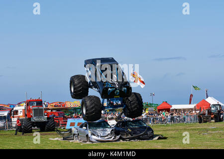 Wrecker Trucks Demonstration Guernsey, West Show,  Horticulture and Agriculture. Crushing cars.'Grim Rea[er'. Stock Photo