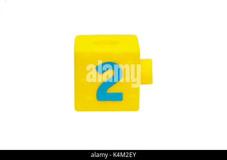 Yellow cube toy isolated on white Stock Photo